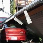 Car under Garage - 1100 block Green Bay St.