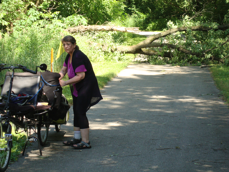 RoZ adjusts gear on The Limo after we turned it around at the down tree blocking the city trail on the north side of La Crosse.